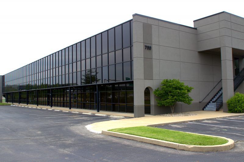 A large building with a lot of windows and stairs