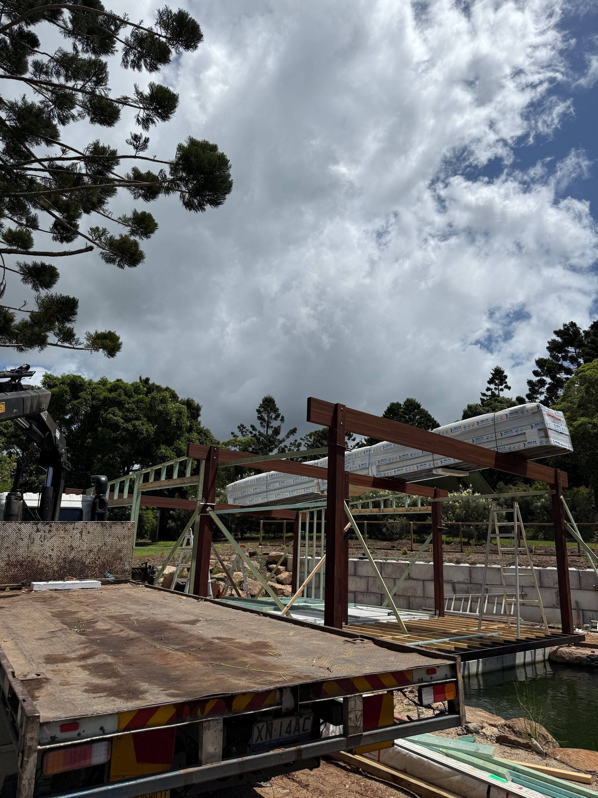 A Steel Frame Has Some Ply Sitting on Top of it — Brodees Crane Trucks in Brisbane, NSW