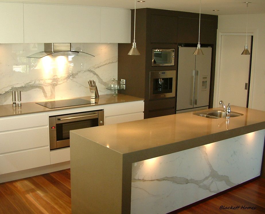 Modern Kitchen With White Upper Cabinets — Rectified Edge Tiling & Bathroom Renovations in Jamison Centre, ACT