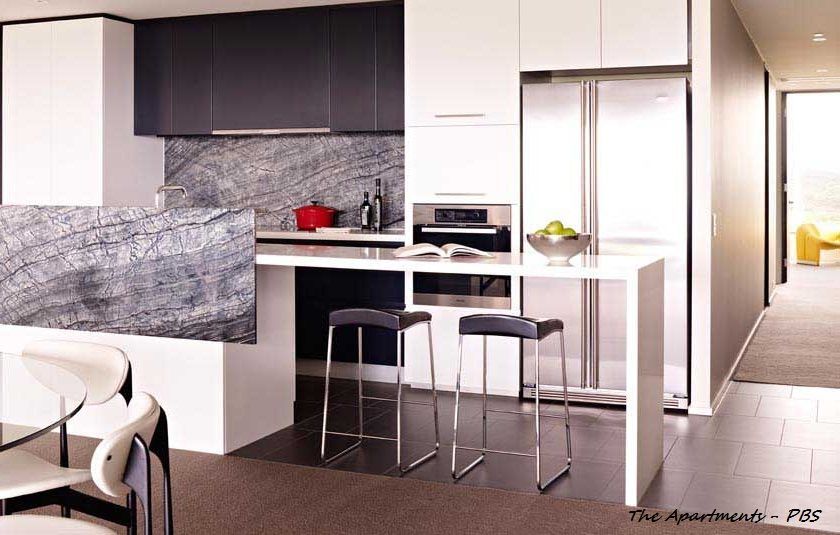 Modern Kitchen With White and Dark Grey Cabinetry — Rectified Edge Tiling & Bathroom Renovations in Jamison Centre, ACT