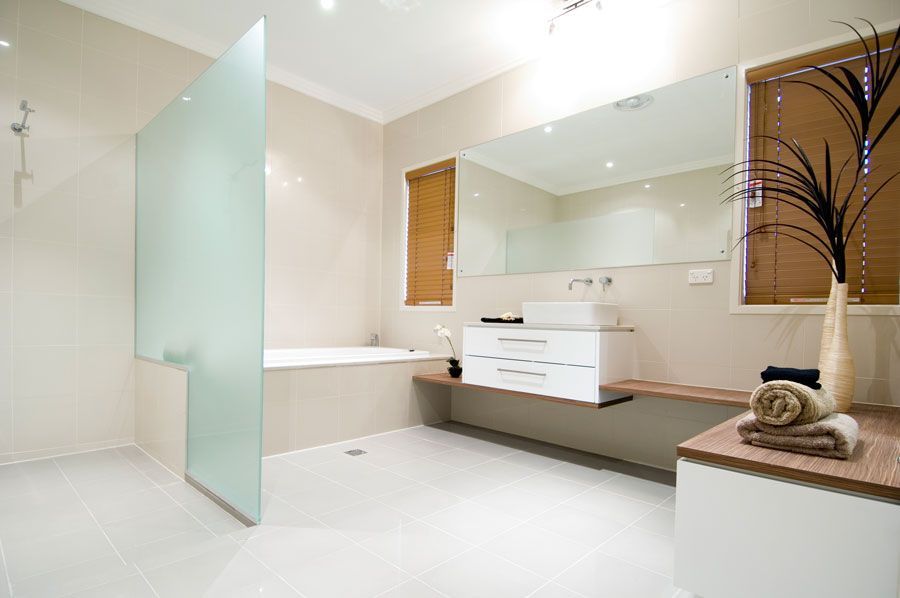 Modern Bathroom With Frosted Glass Shower — Rectified Edge Tiling & Bathroom Renovations in Jamison Centre, ACT
