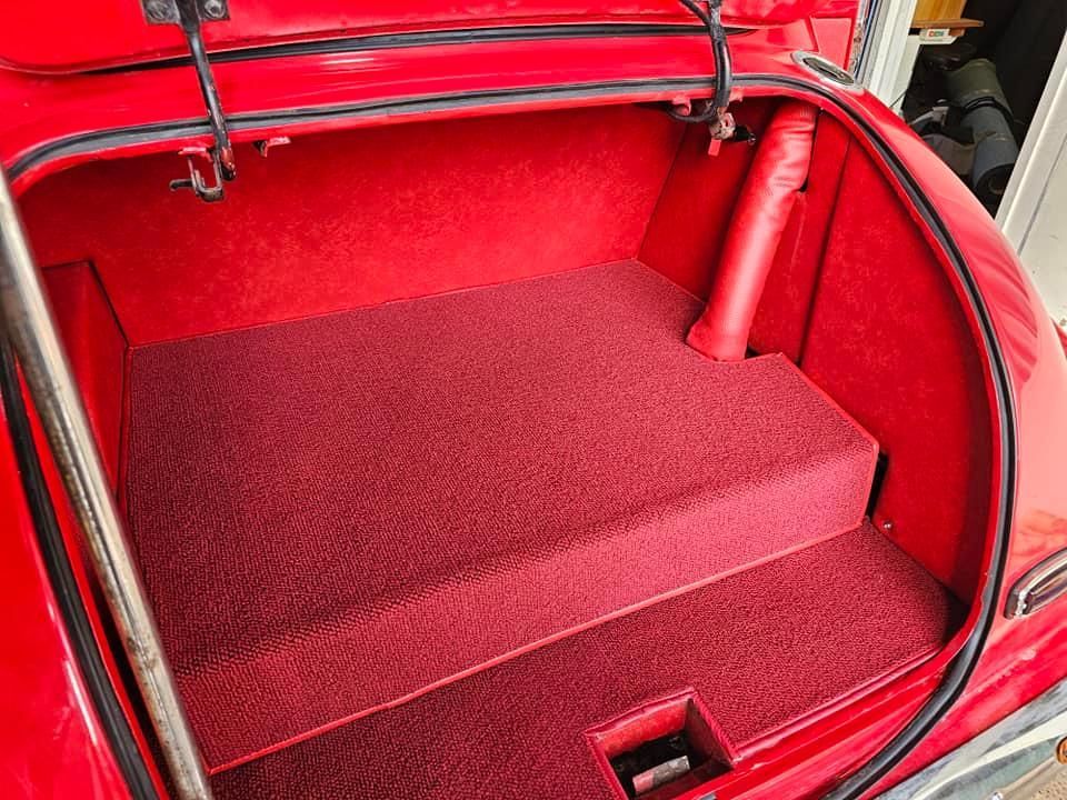 The Trunk Of A Red Car Is Covered In Red Carpet — All Car Upholstery In Pinelands, NT