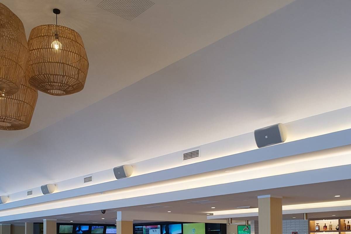 A Large Room With a Ceiling That Has a Lot of Lights on It  — Commercial Painting Group in Thirroul, NSW