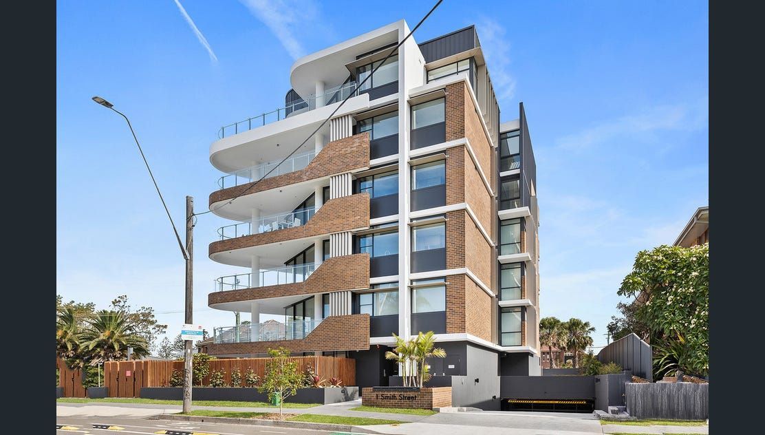An apartment building with five balconies — Commercial Painting Group in Kembla Grange, NSW