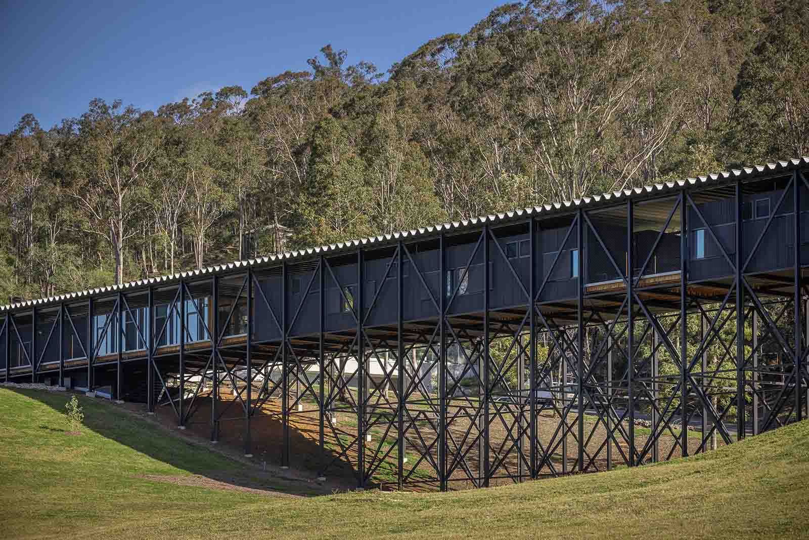 A large bridge on stilts and hills behind it — Commercial Painting Group in Kembla Grange, NSW