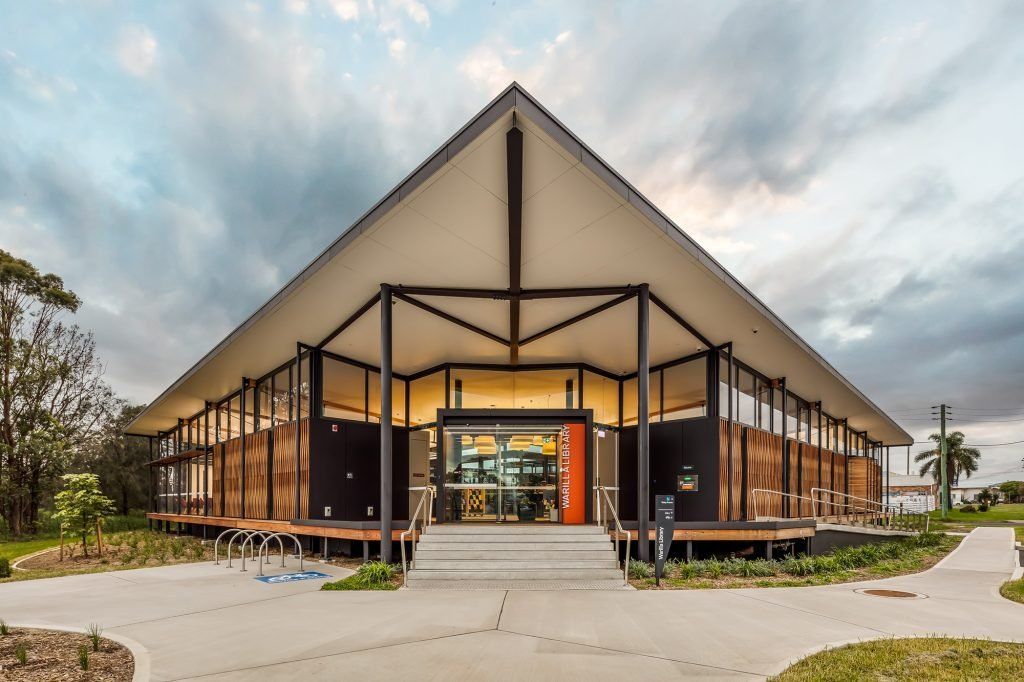 The front entrance of a library with a wooden deck — Commercial Painting Group in Kembla Grange, NSW