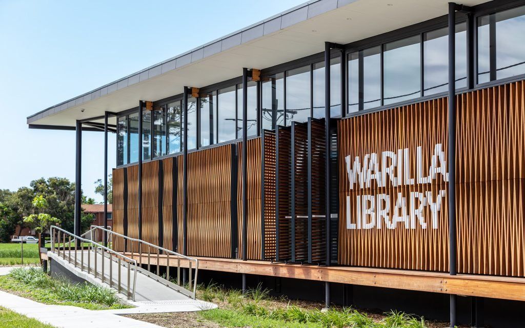 A building with a ramp leading up to it — Commercial Painting Group in Kembla Grange, NSW