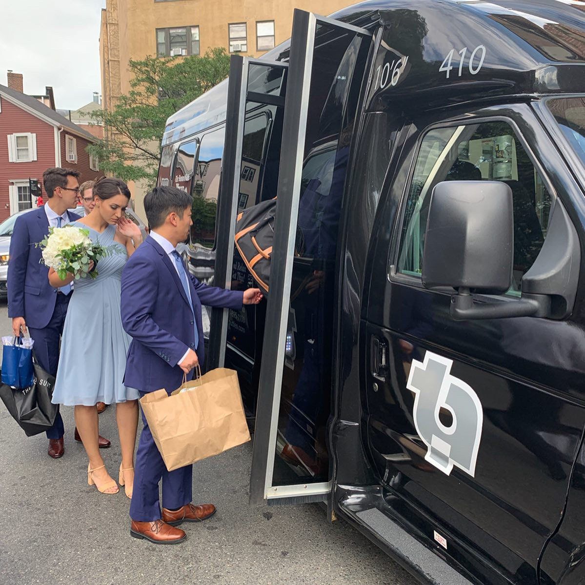 wedding-guests-boarding-shuttle-bus