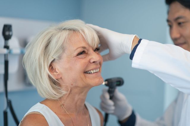 Old Lady Consulting Hearing Loss — Brooklyn, NY — Urban Hearing