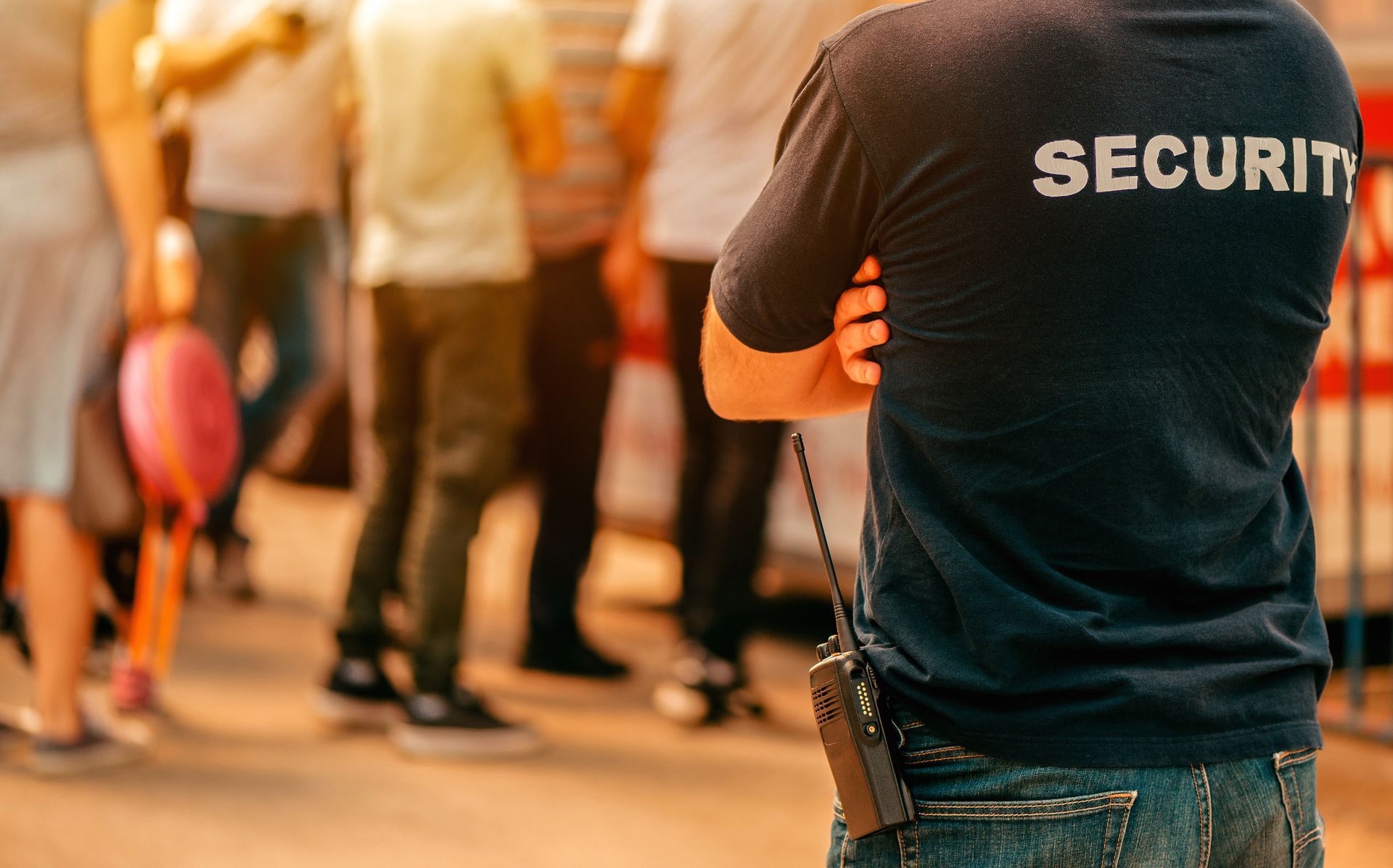 Security guard in blue shirt with 