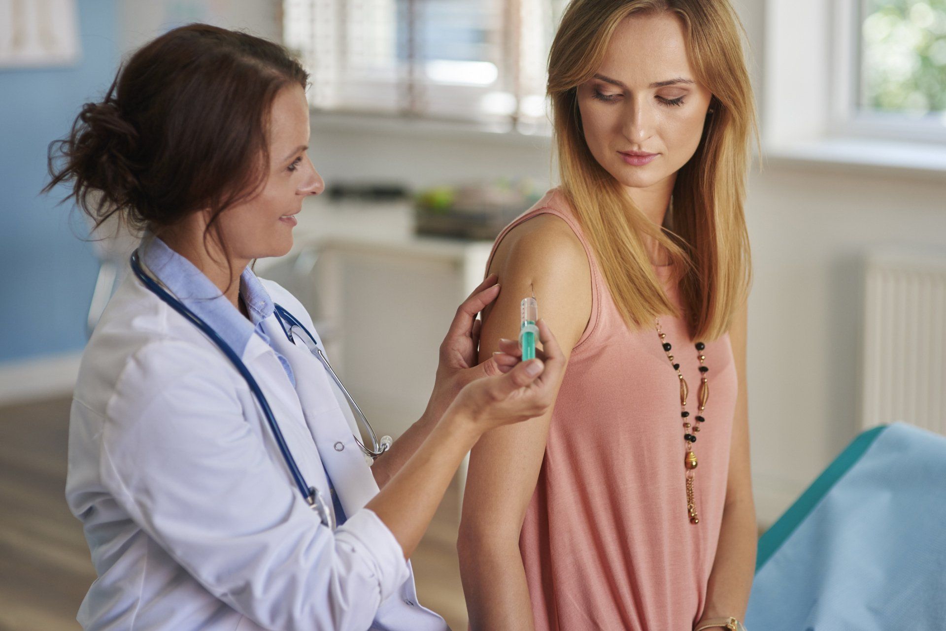 Giving Vaccine to A Woman — Memphis, TN — Vaccine Injury Lawyers Giving Vaccine to A Woman — Memphis, TN — Vaccine Injury Lawyers