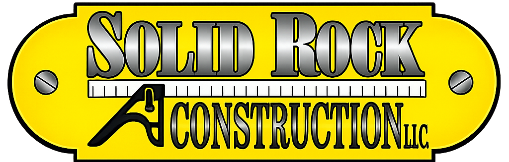 Solid Rock Construction Inc. logo on a yellow plaque with black lettering and riveted ends