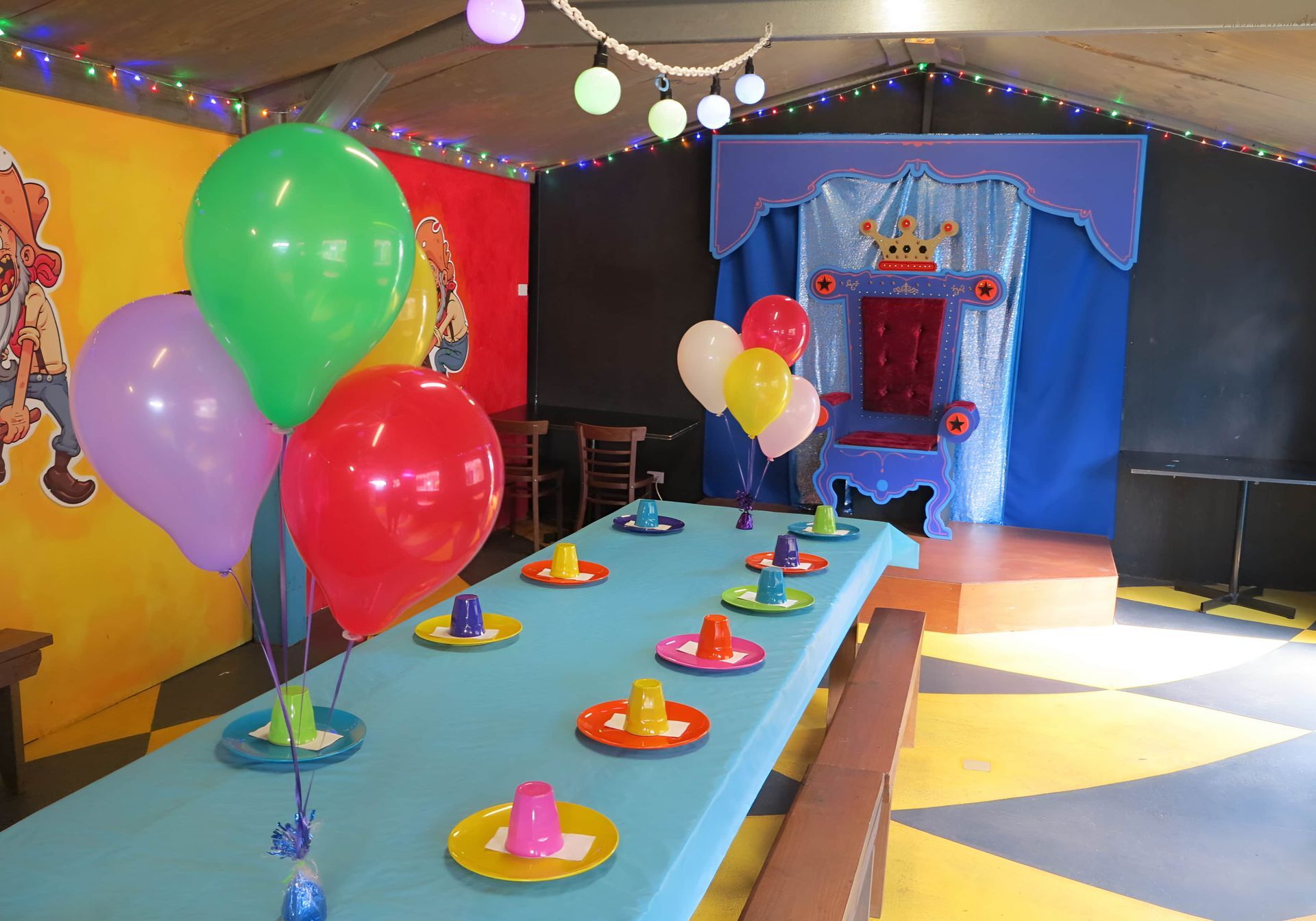 A Restaurant Called the Gold Rush Cafe Has Tables and Chairs Set Up — Gold Rush Mini Golf in Warrenheip, VIC