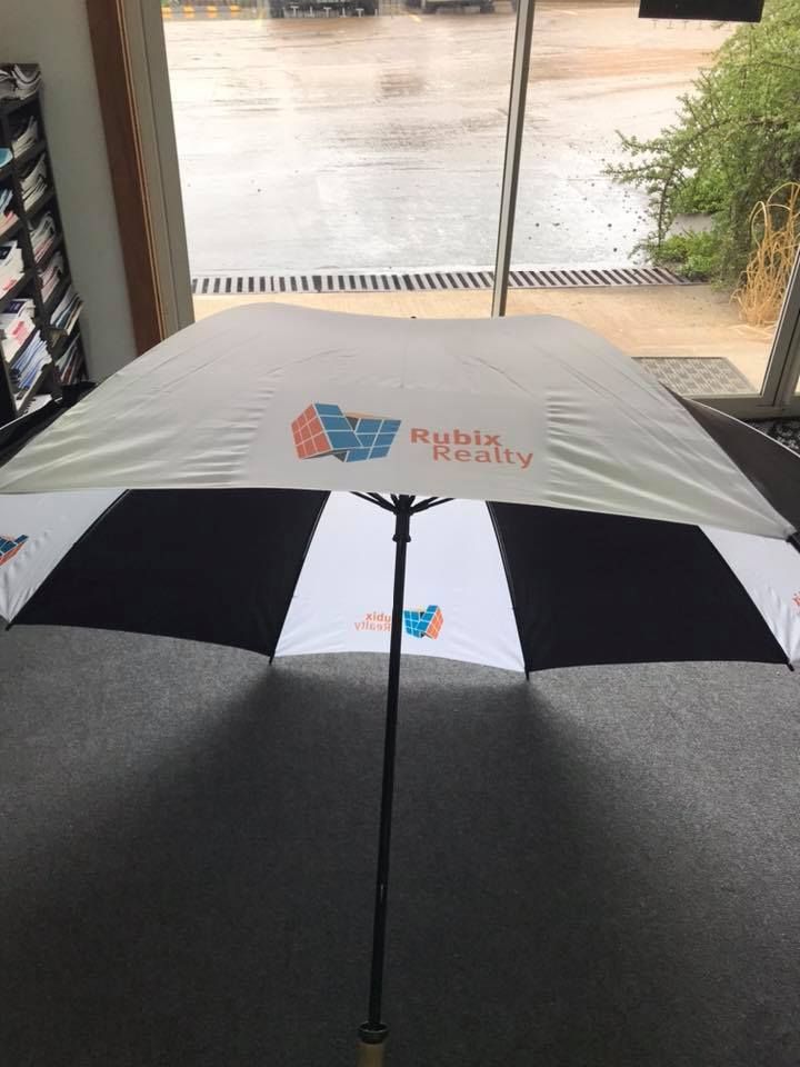 White And Black Umbrella With The Word Mobix Realty — Accolades Awards Hunter Valley In Maitland, NSW