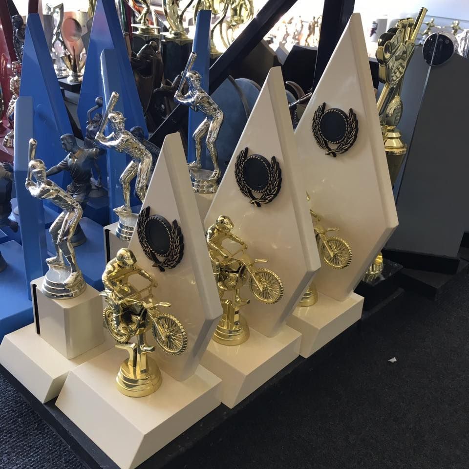 Row Of Trophies Including One For A Motorcycle Rider — Accolades Awards Hunter Valley In Maitland, NSW