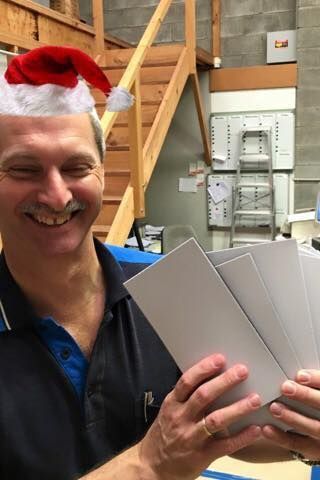 Man Wearing A Santa Hat Holding A Stack Of Envelopes — Accolades Awards Hunter Valley In Maitland, NSW