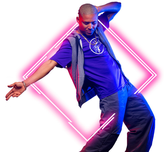 A man in a purple shirt is dancing with his arms outstretched