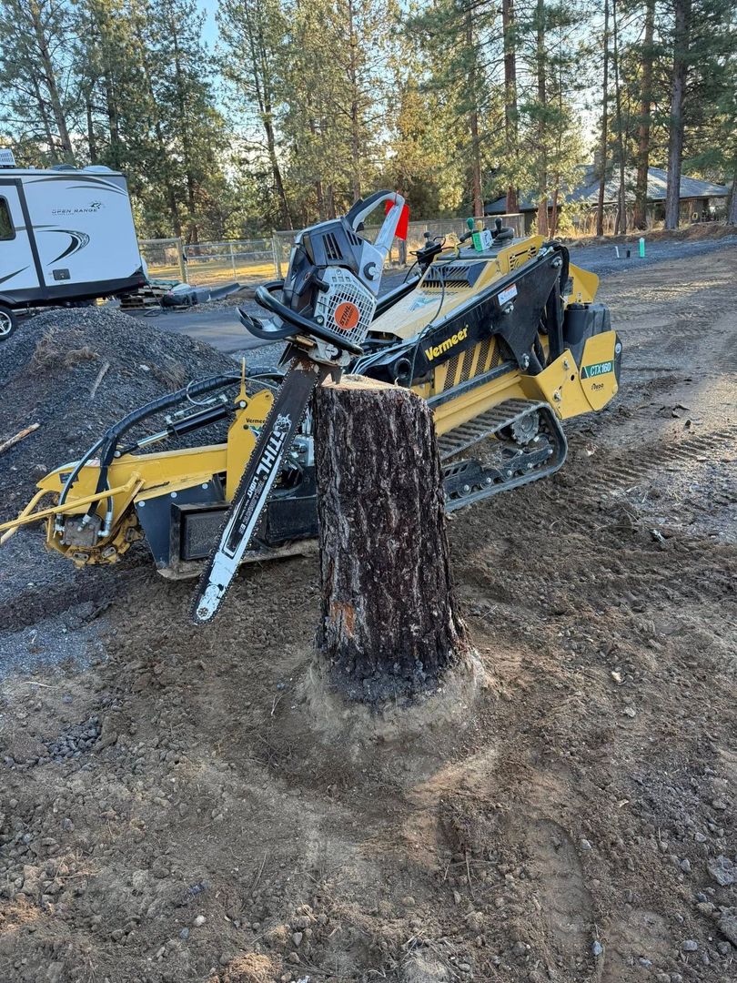 Commercial stump grinder in operation grinding a stump in Central Oregon