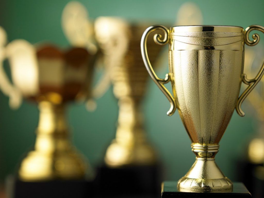 Gold trophy used for blog post ‘The History of Trophies You Might Not Know About’ — symbolizing excellence and tradition.