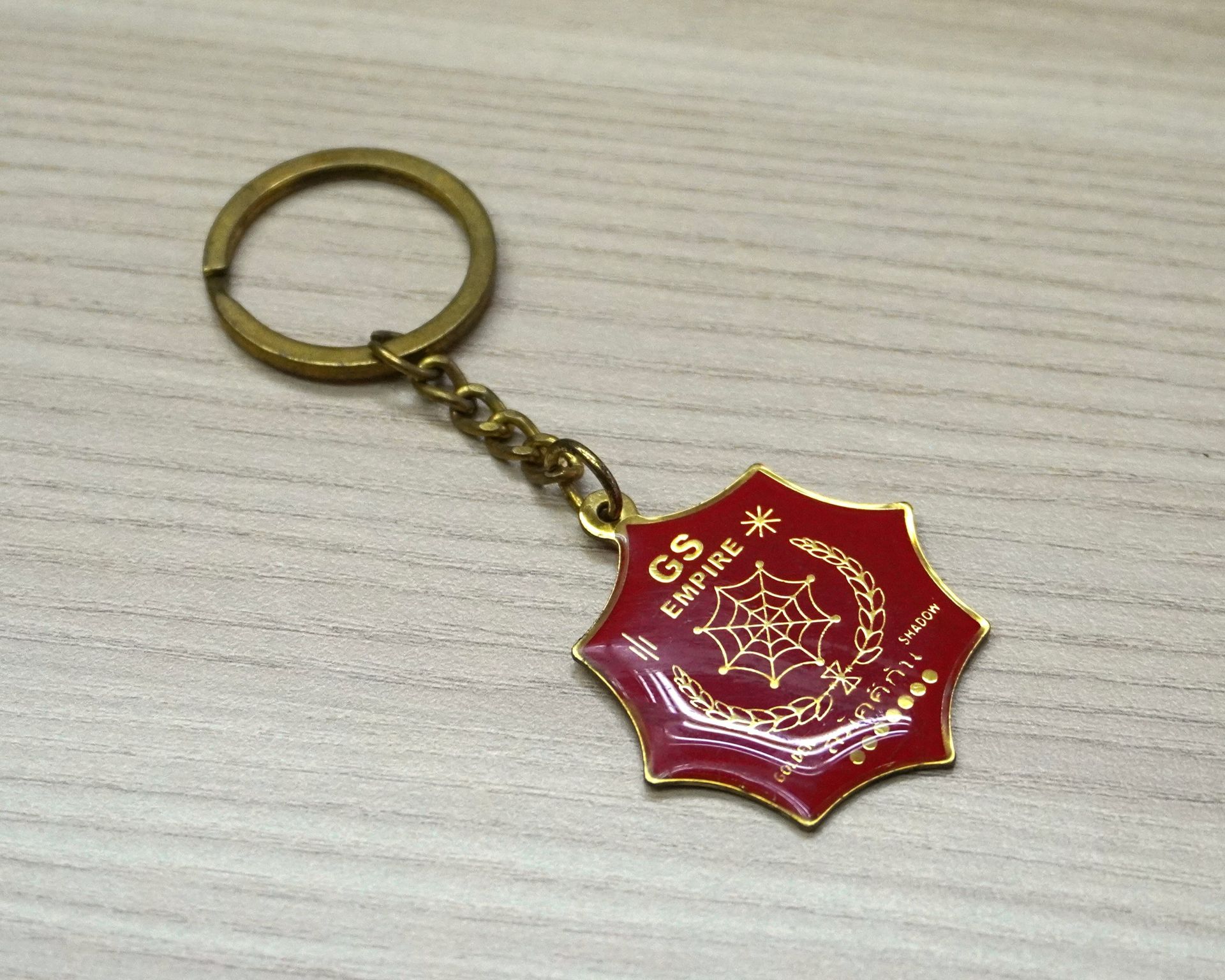 Custom gold keychain with branded design, ideal for corporate gifting