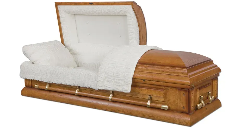 White upholstered casket with wood trim and base, shown open on a white background