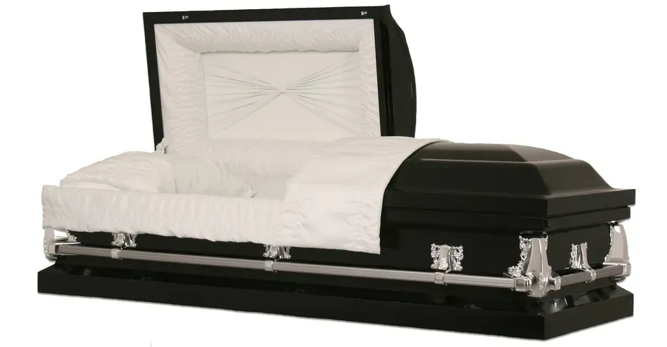 Black casket with white satin lining and an open lid on a white background