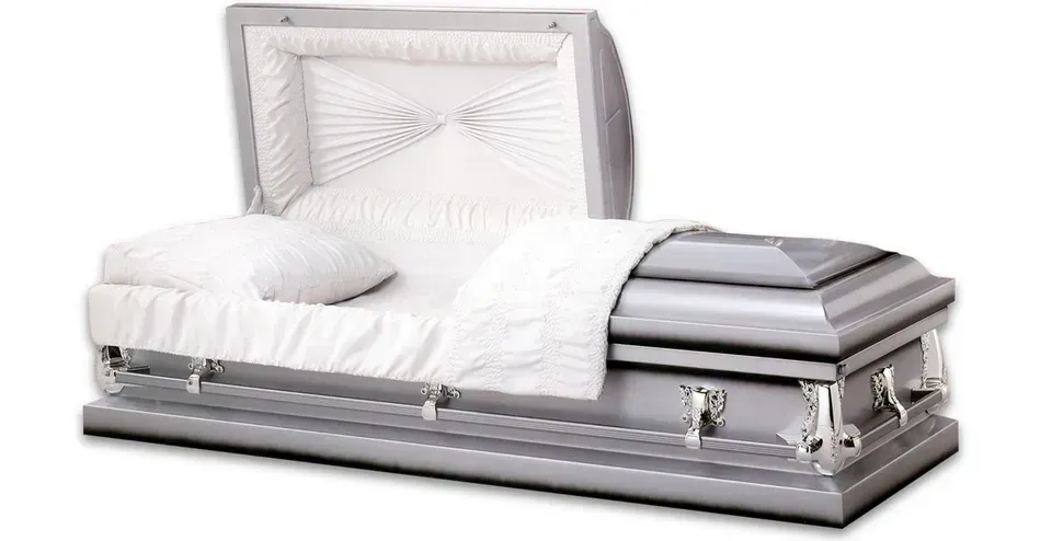 White casket with open lid and padded interior, shown at an angle on a plain white background