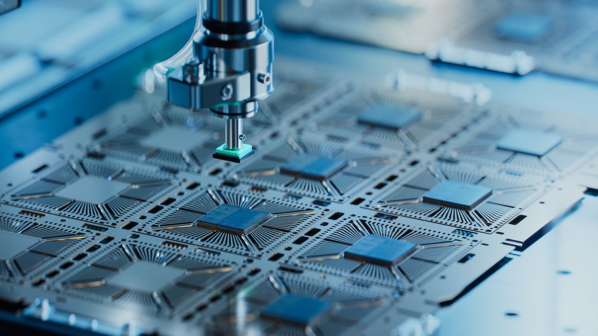 Robotic arm placing chips on a circuit board, close-up of manufacturing process.