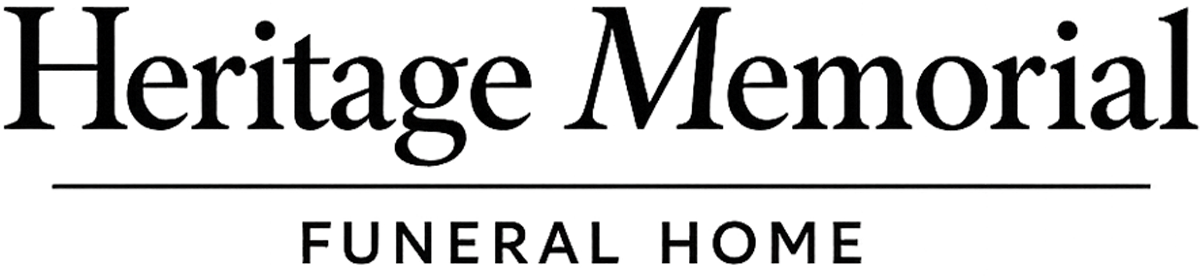 Heritage Memorial funeral home logo in black text with a horizontal line underneath.