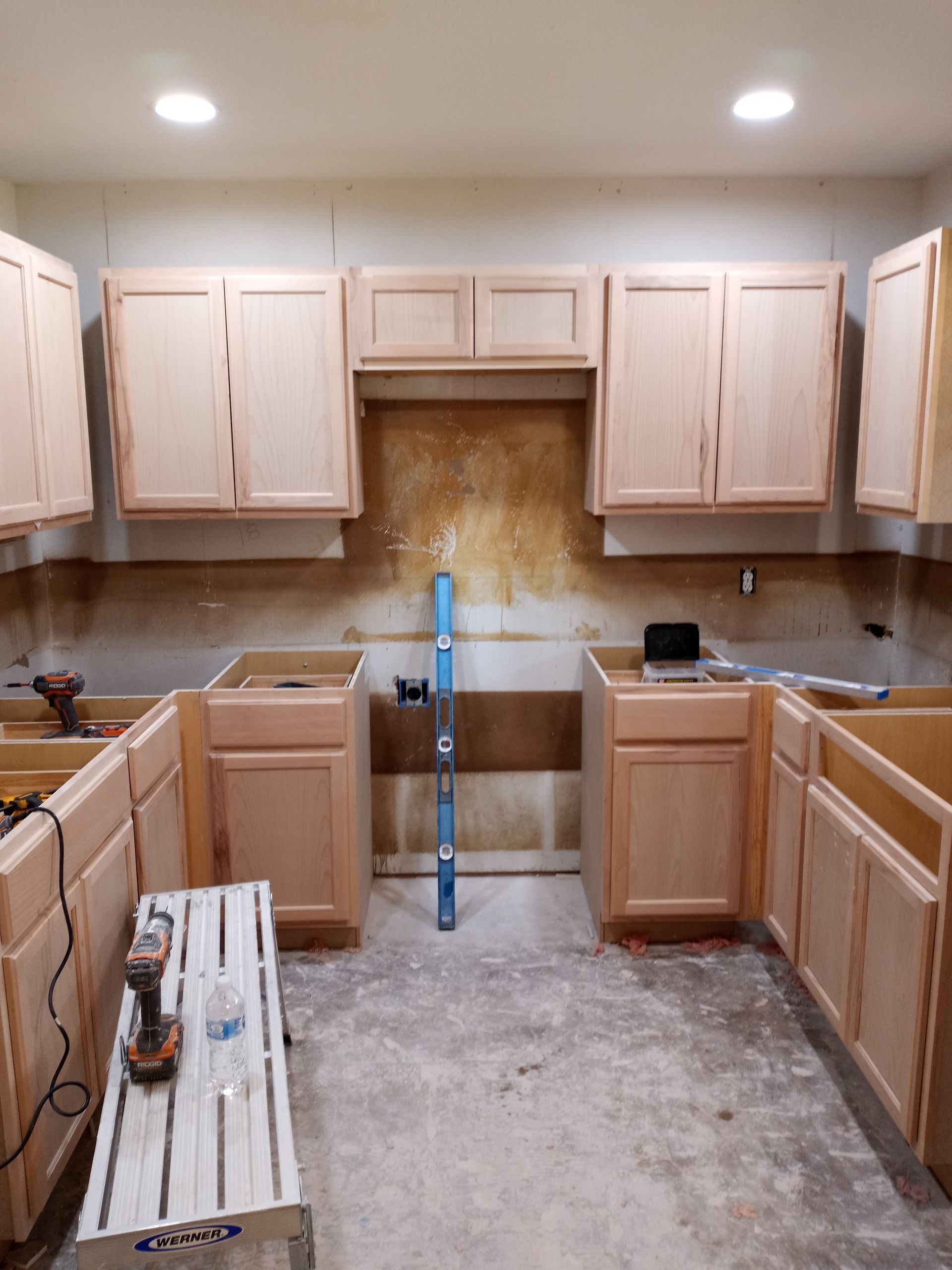 a bathroom with a toilet and shower under construction .