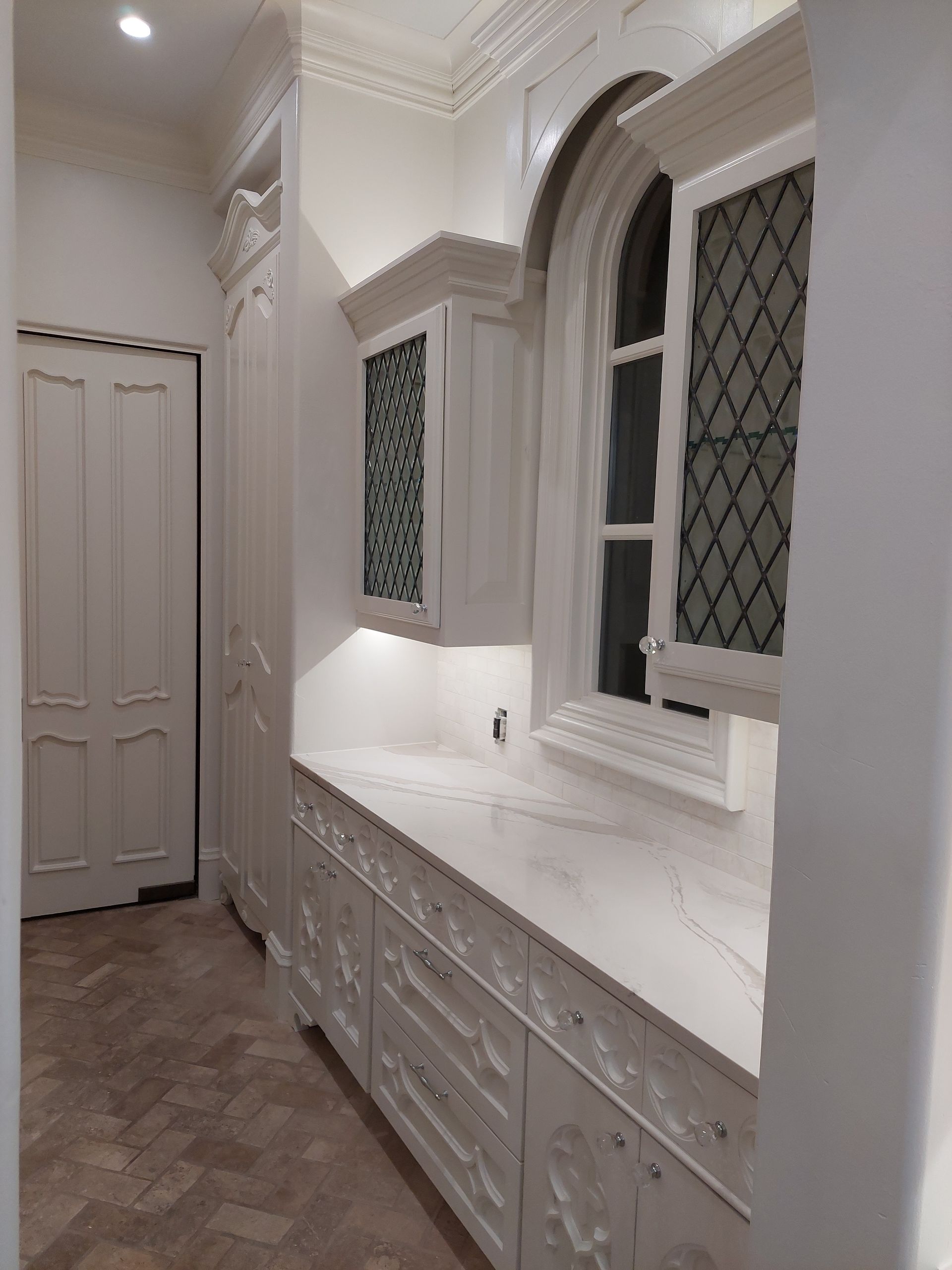 a bathroom with a bathtub and a walk in shower .