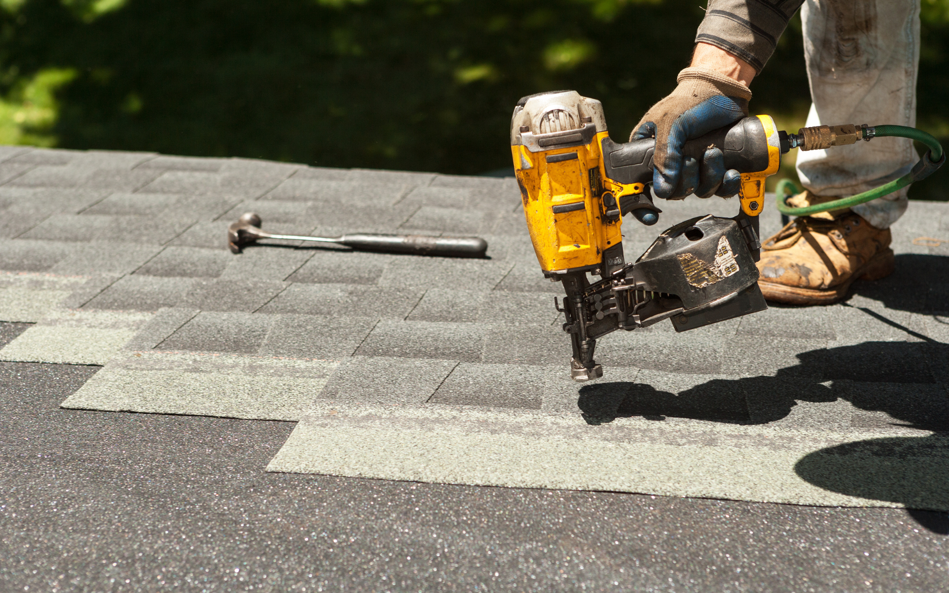 an aerial view of a roof being installed by a roofer .