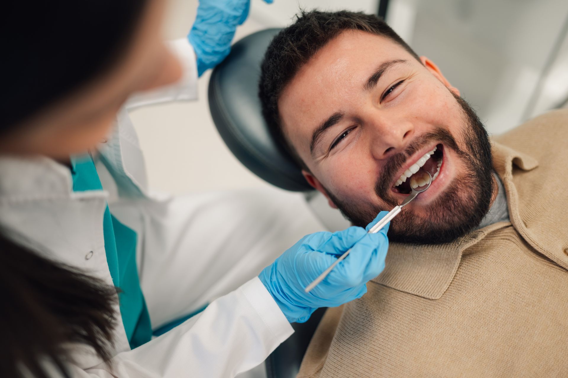 Dental check-up helping identify whether a tooth can be restored or requires removal
