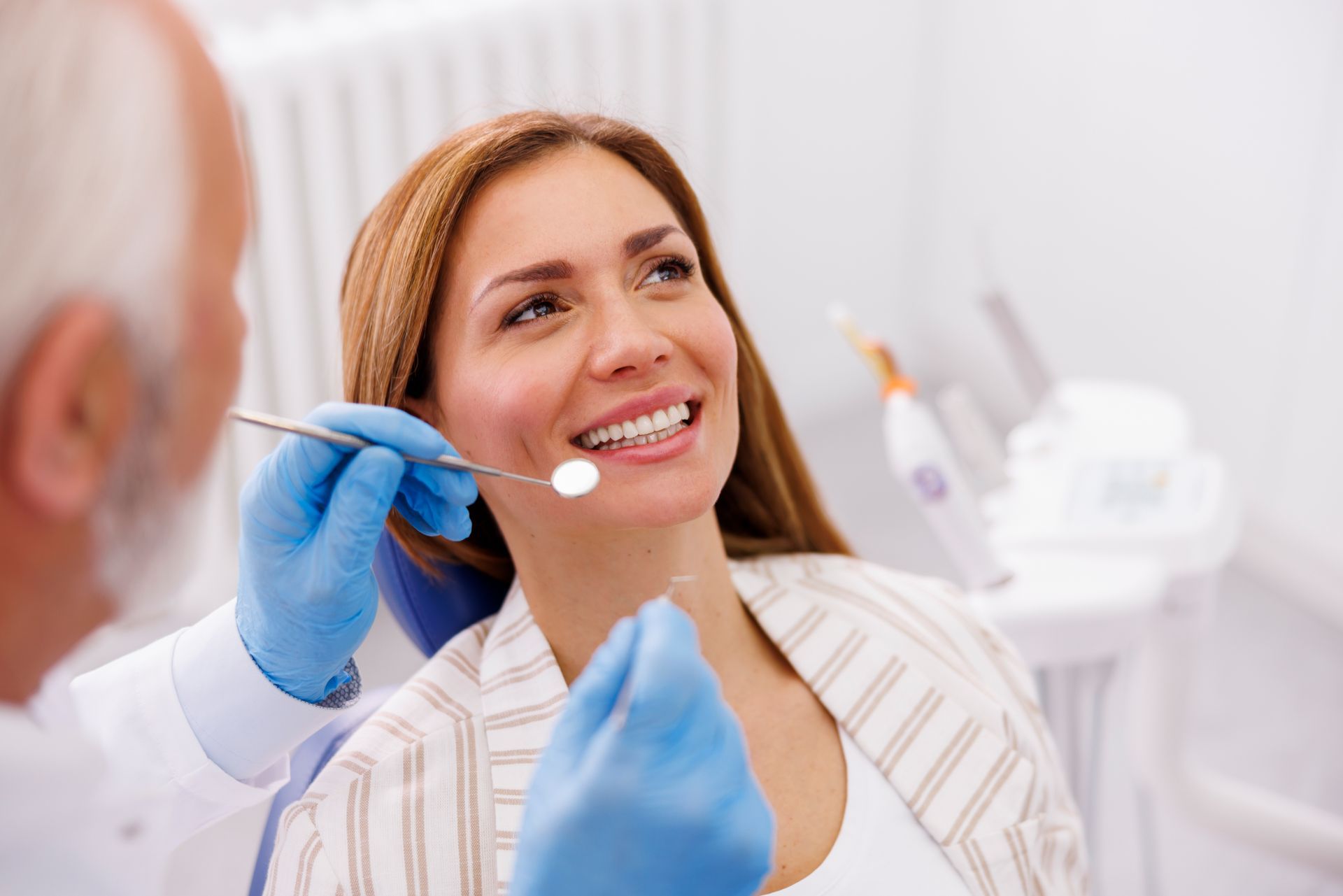 woman at a dental checkup at dentist's office