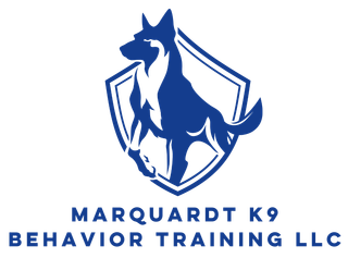 The logo for marquardt k9 behavior training llc shows a dog on a shield.