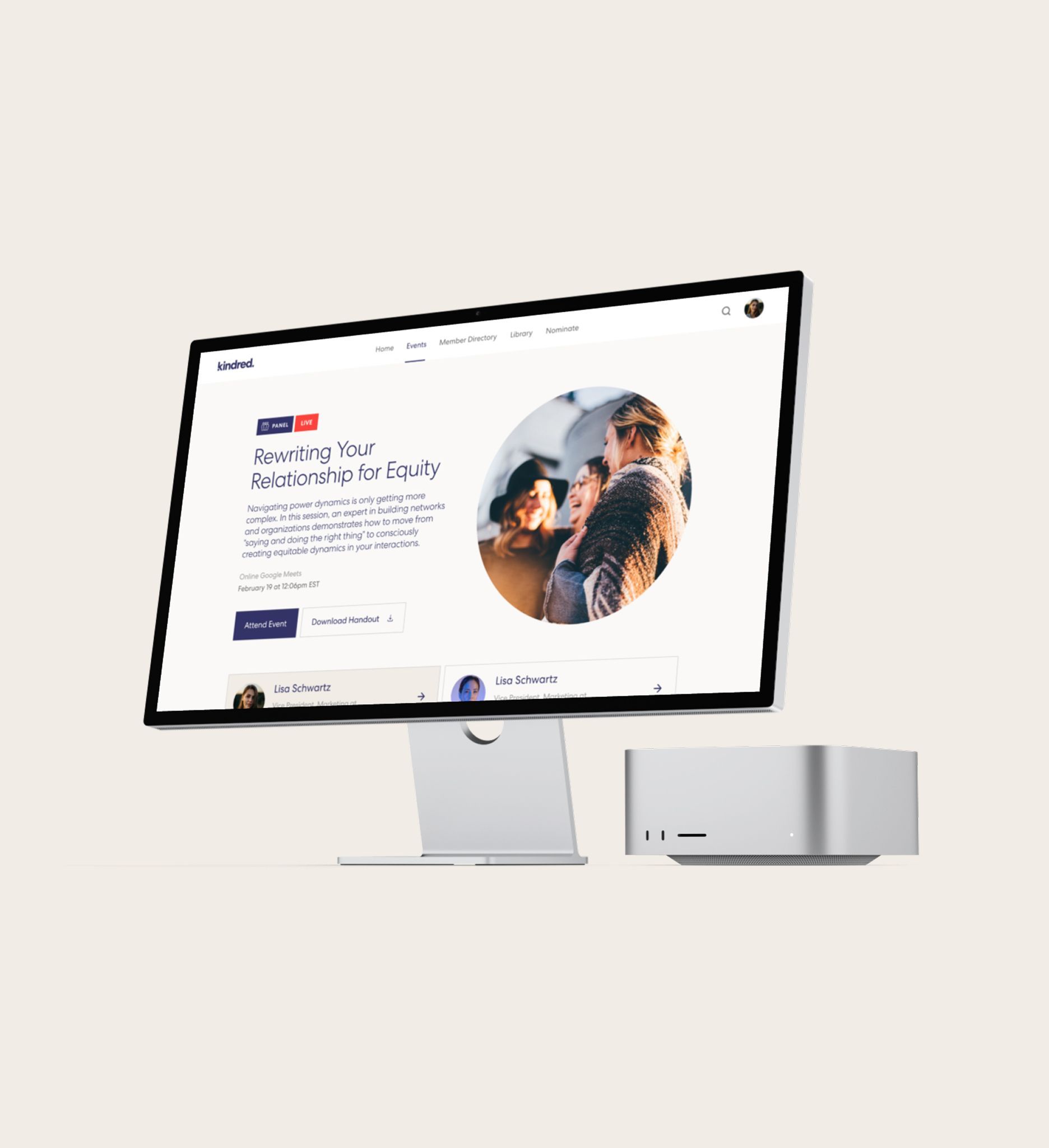 A silver computer monitor displaying a website, with a matching desktop computer, against a beige background.