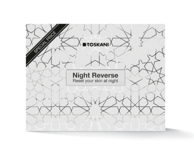 Toskani Night Reverse Hautpflegeverpackung mit silbernem Sternenmuster und weißem Etikett auf hellem Hintergrund