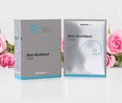 Zwei Maskenboxen von Skin Architect, grau und weiß mit türkisfarbenen Akzenten, auf hellem Hintergrund mit rosa Rosen.