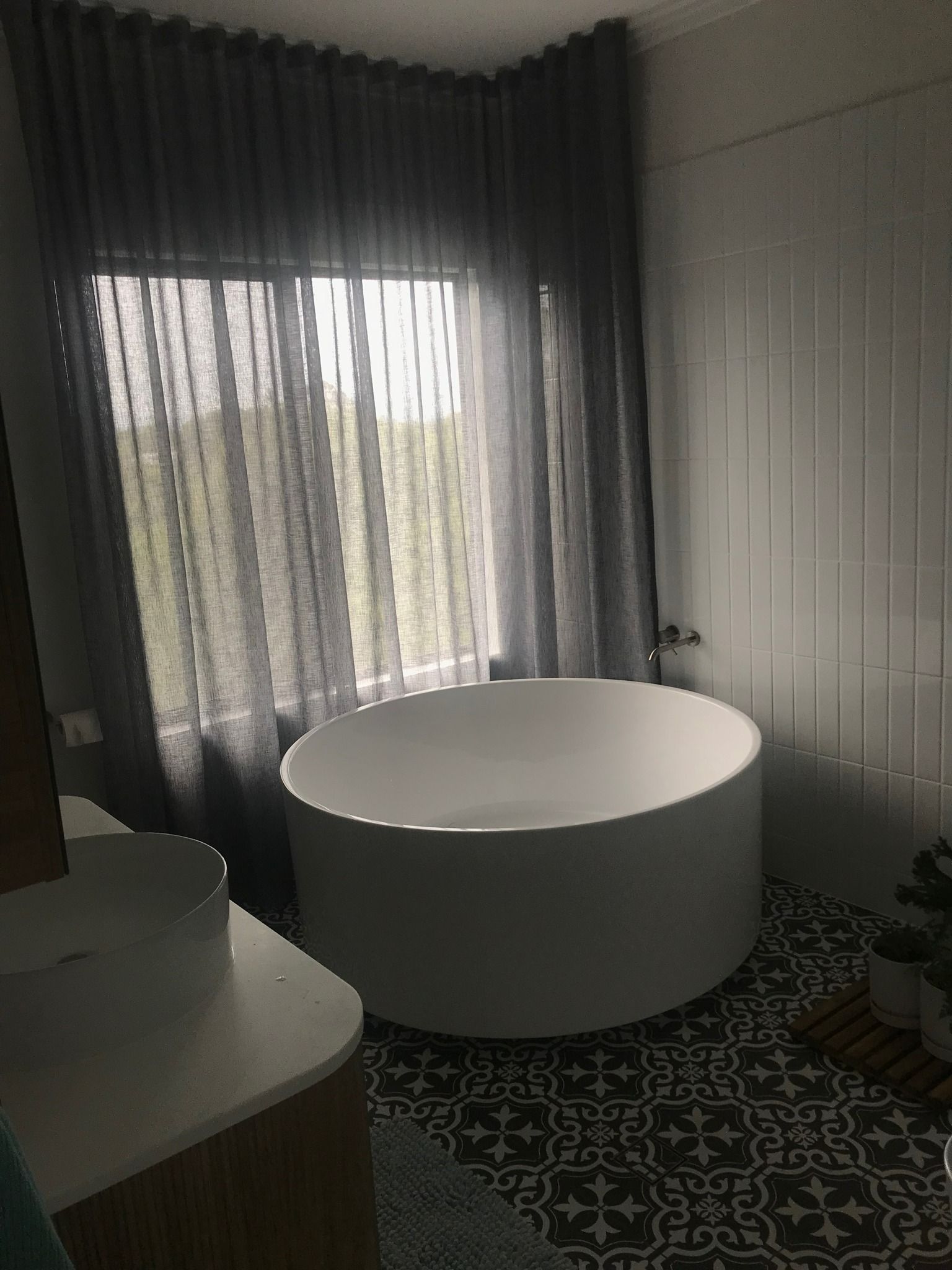 Bright Room With a Large Round White Table and Sheer Curtains — Curtain Concepts in Kingscliff, NSW