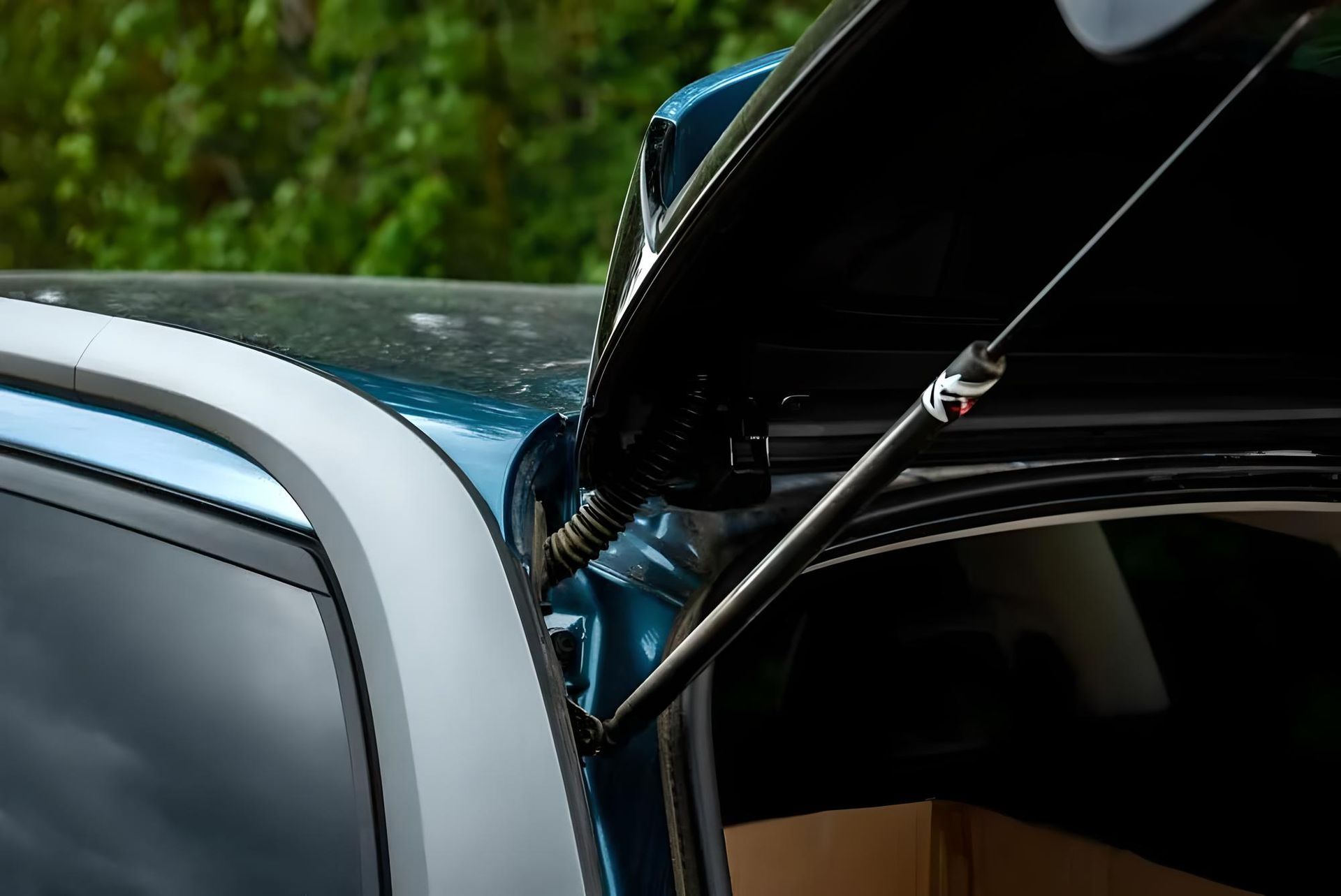 The Trunk of a Car is Open and There is a Box in It — Neilsen's Radiator Service in Toowoomba City, QLD