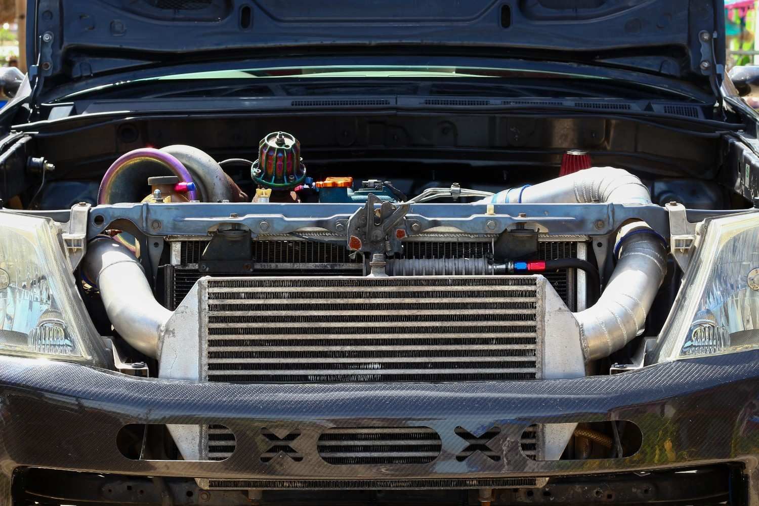 The Hood of a Truck is Open and the Engine is Visible — Neilsen's Radiator Service in Toowoomba City, QLD