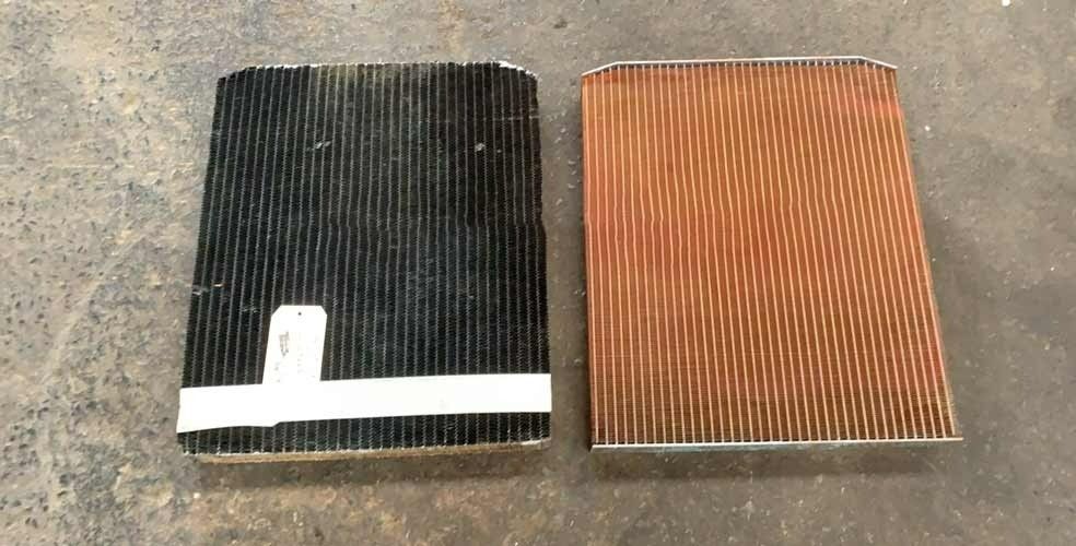 Two Radiators Are Sitting Next to Each Other on the Ground — Neilsen's Radiator Service in Toowoomba City, QLD
