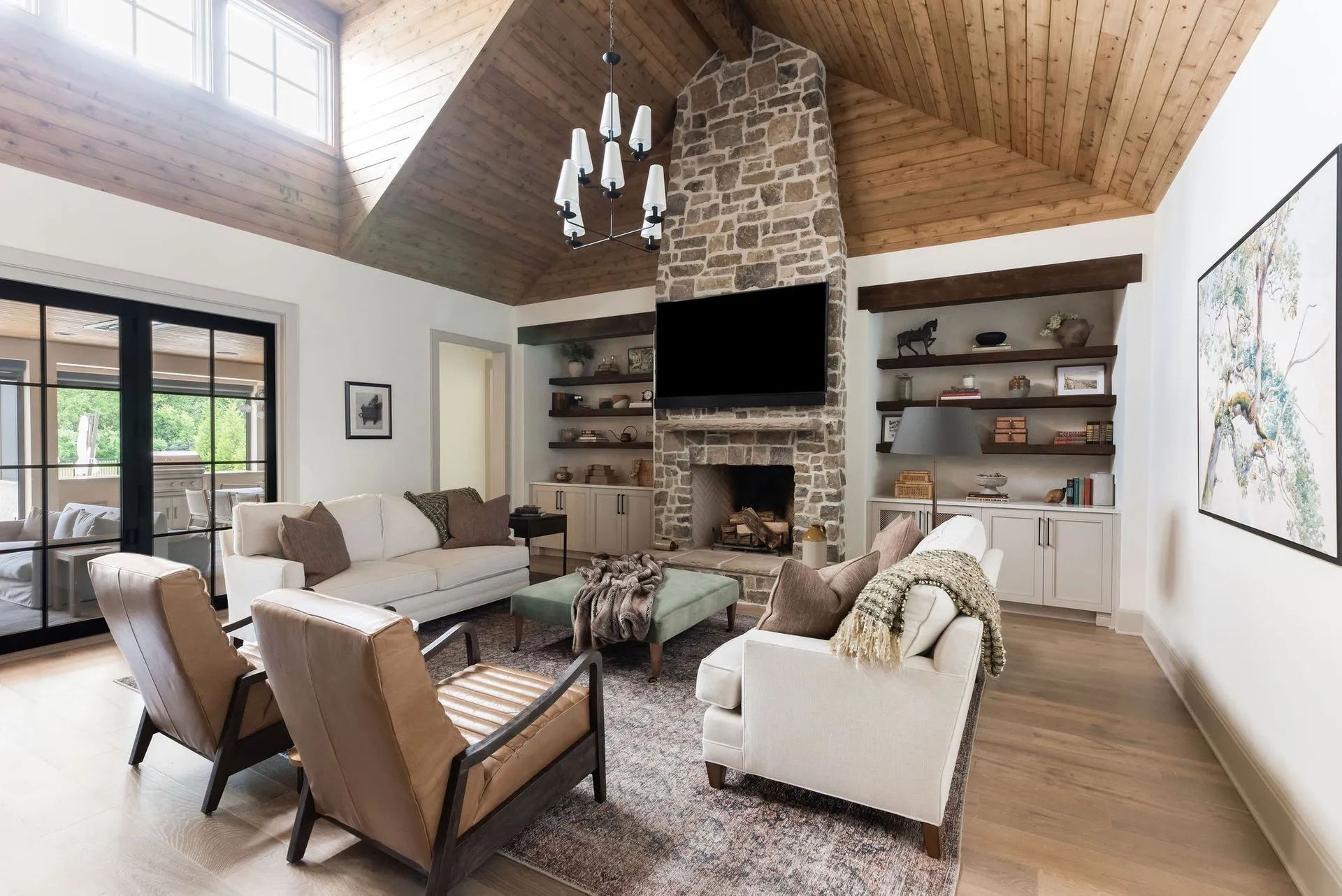 A living room filled with furniture and a fireplace.