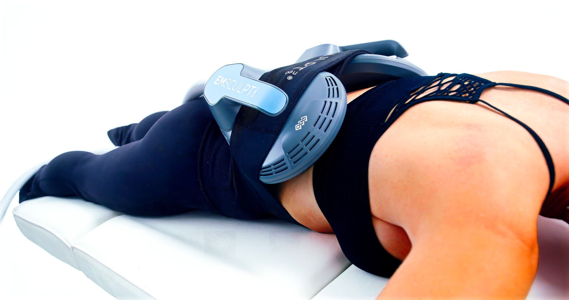 Emsculpt Neo applicator treating the back during a body contouring session