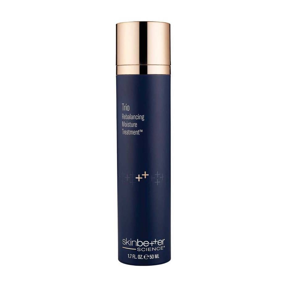 A blue bottle of lotion with a gold cap on a white background.