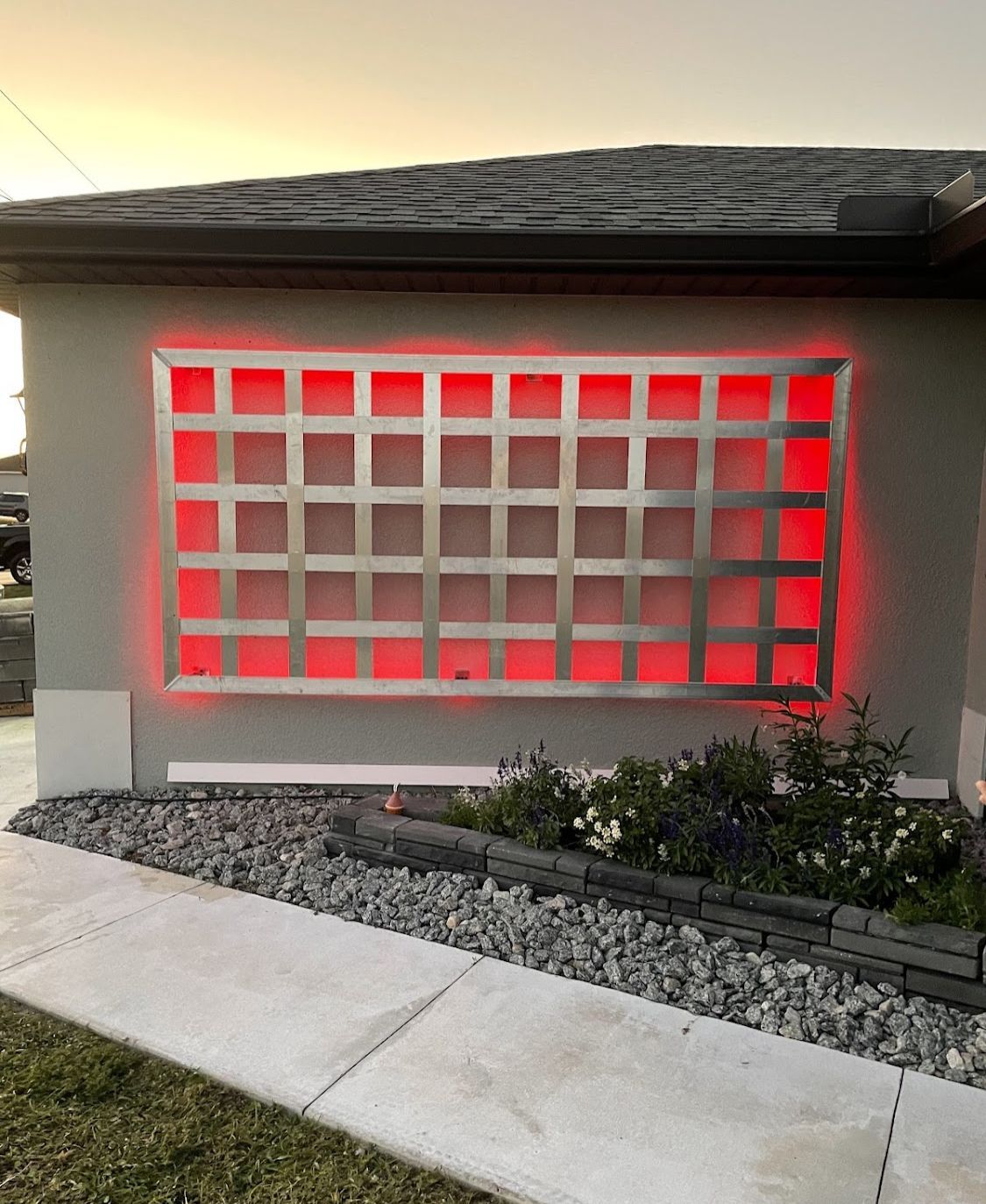 A house with red lights on the side of it