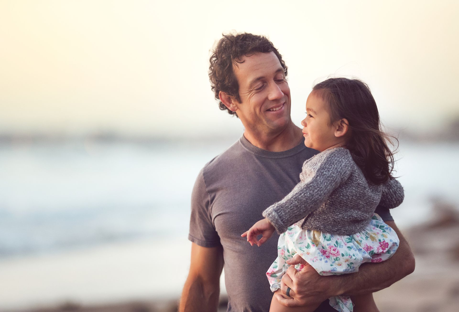 A father carrying his child – Springfield, OR – Thorp Purdy Jewett Urness