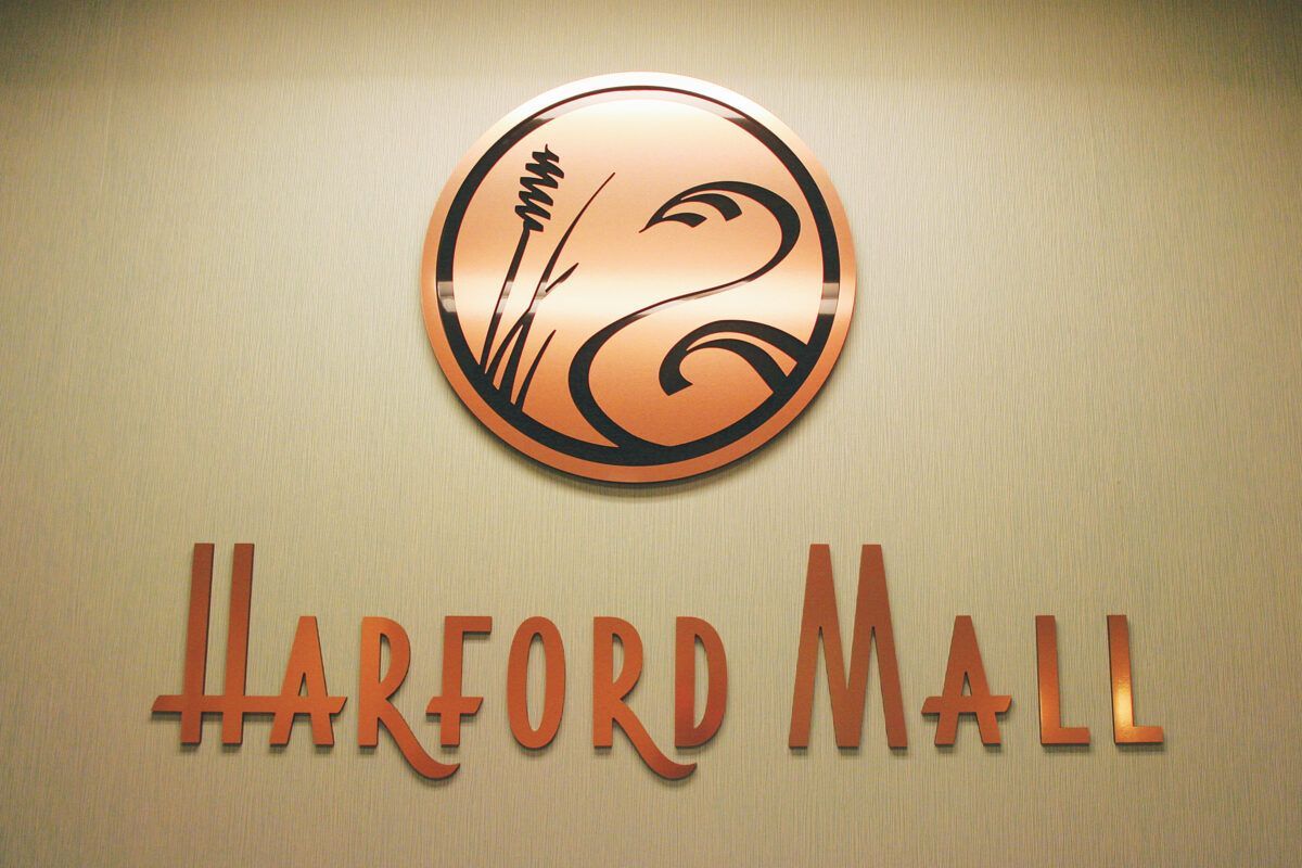Dimensional Harford Mall sign with gemleaf finish on textured background