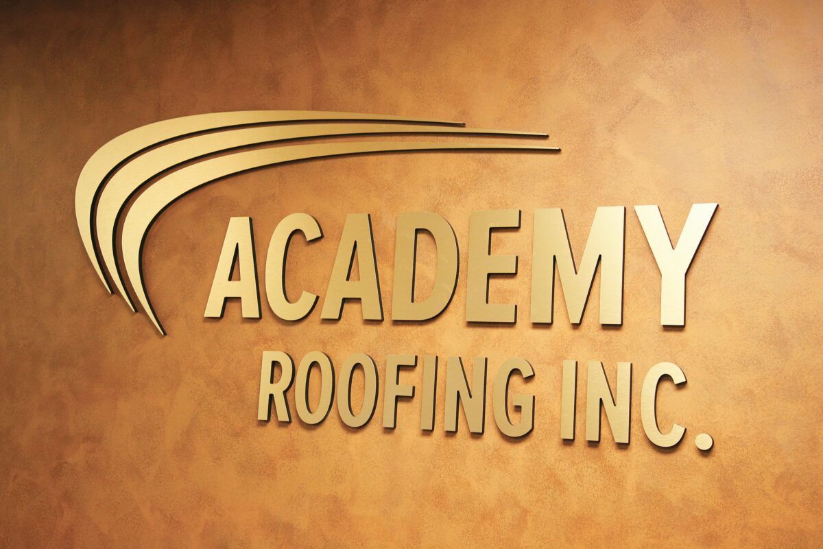 Metal-on-acrylic dimensional logo sign for Academy Roofing Inc