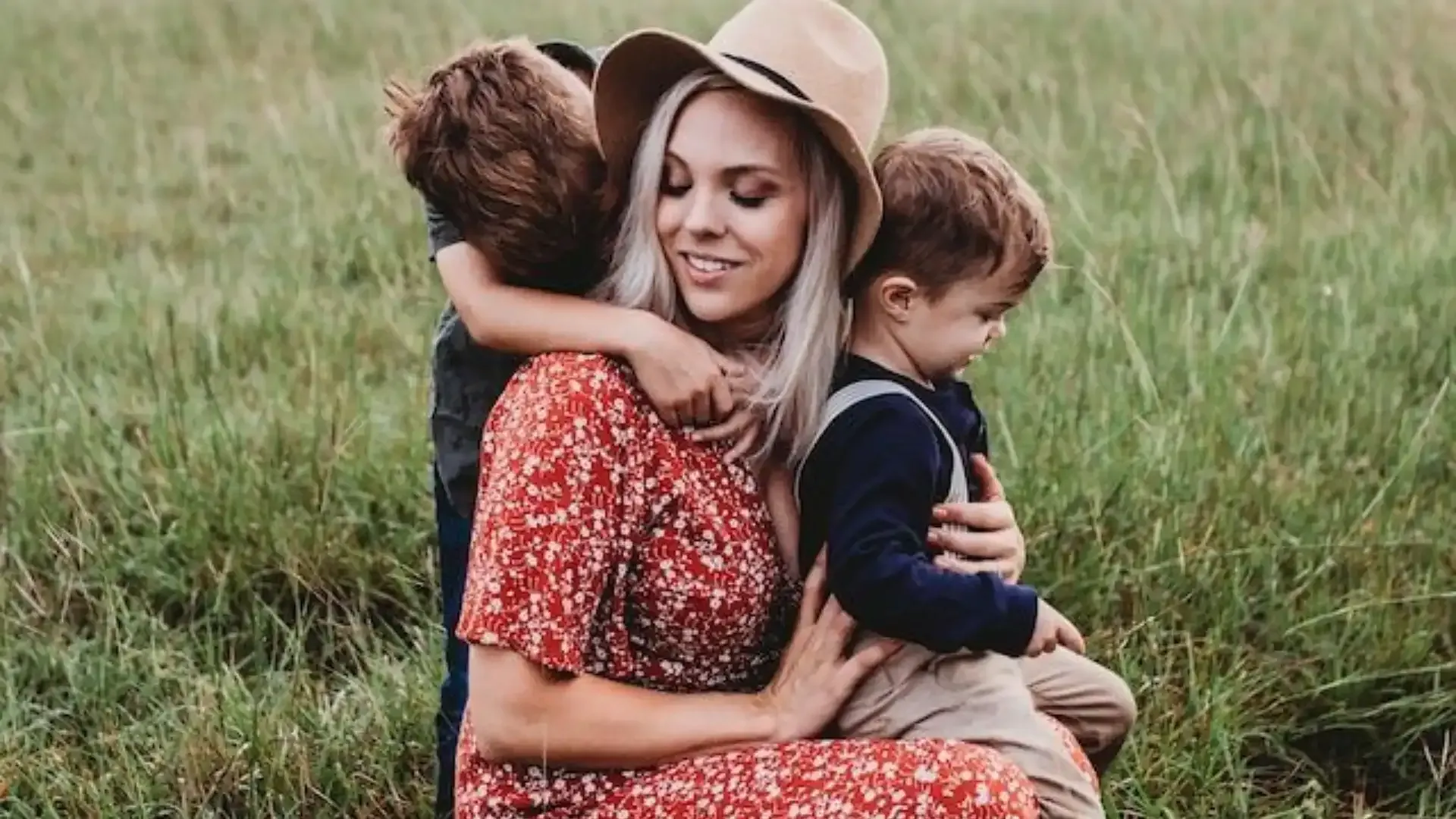 Woman with her young children